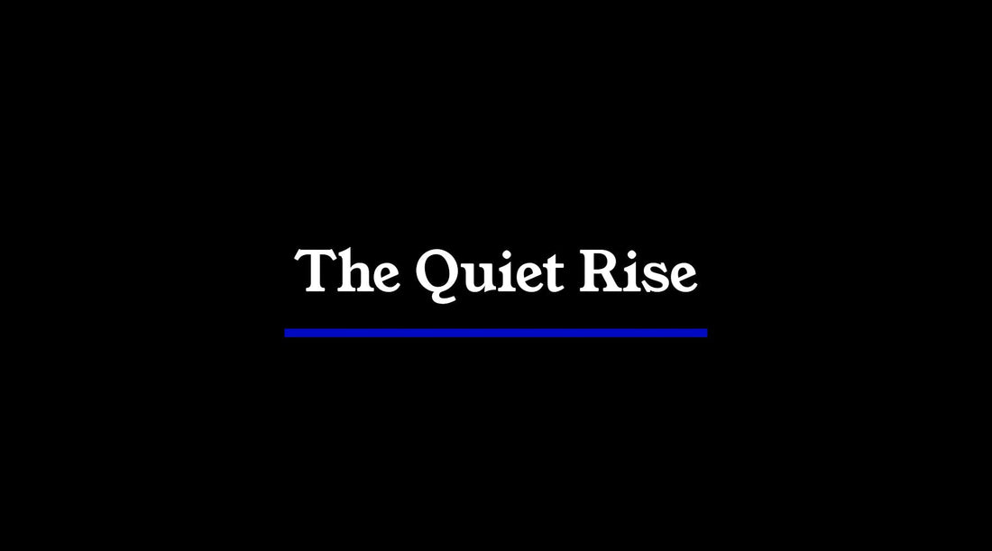 Minimalist journal header with black background, white typography, and a single blue line, reflecting restraint, clarity, and quiet authority.