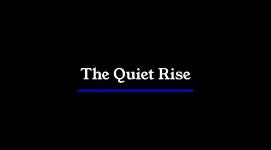 Minimalist journal header with black background, white typography, and a single blue line, reflecting restraint, clarity, and quiet authority.