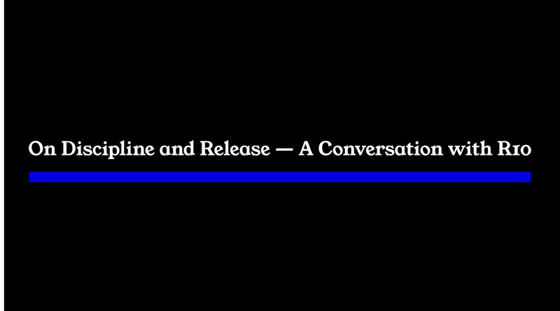 Minimalist journal header with black background, white typography, and a single blue line, reflecting restraint, clarity, and quiet authority.
