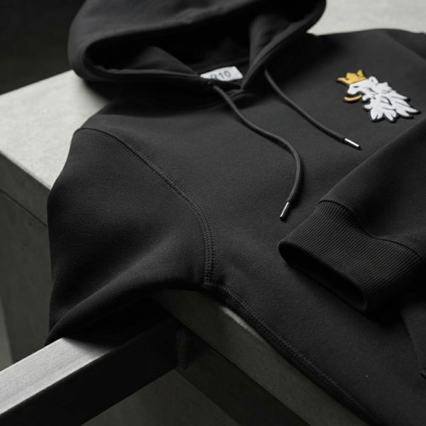 Heavyweight hoodie construction highlighting premium stitching and craftsmanship.