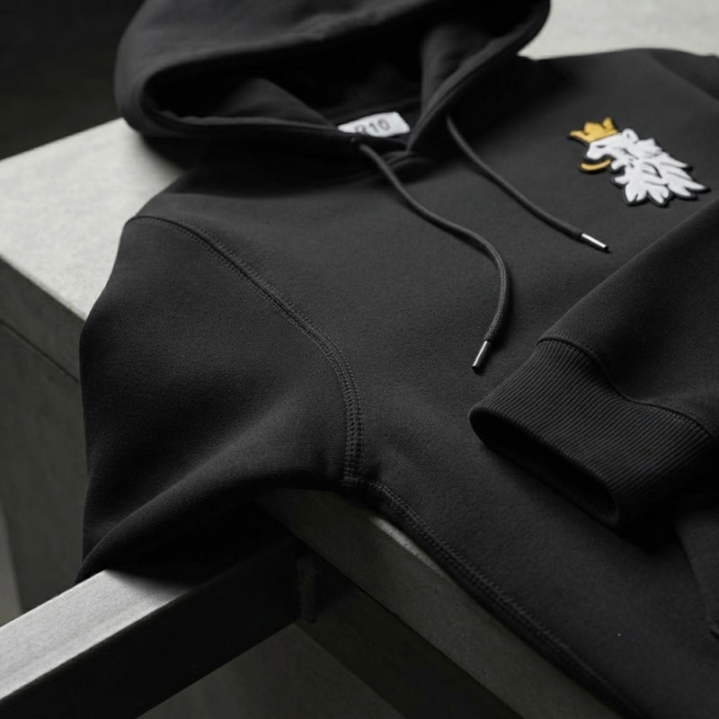 Heavyweight hoodie construction highlighting premium stitching and craftsmanship.