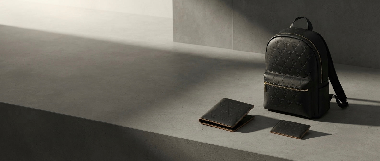 Premium full rain leather cardholder, wallet, and backpack arranged n a luxury editorial composition. The image represents R10' intentional carry philosophy, emphasizing structure, discipline, and everyday organization through timeless craftsmanship. 