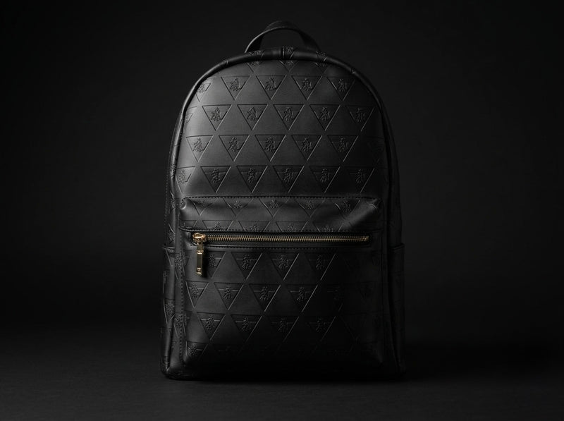 Front view of Leão Branco Motif leather backpack showing structured design and minimalist daily carry style