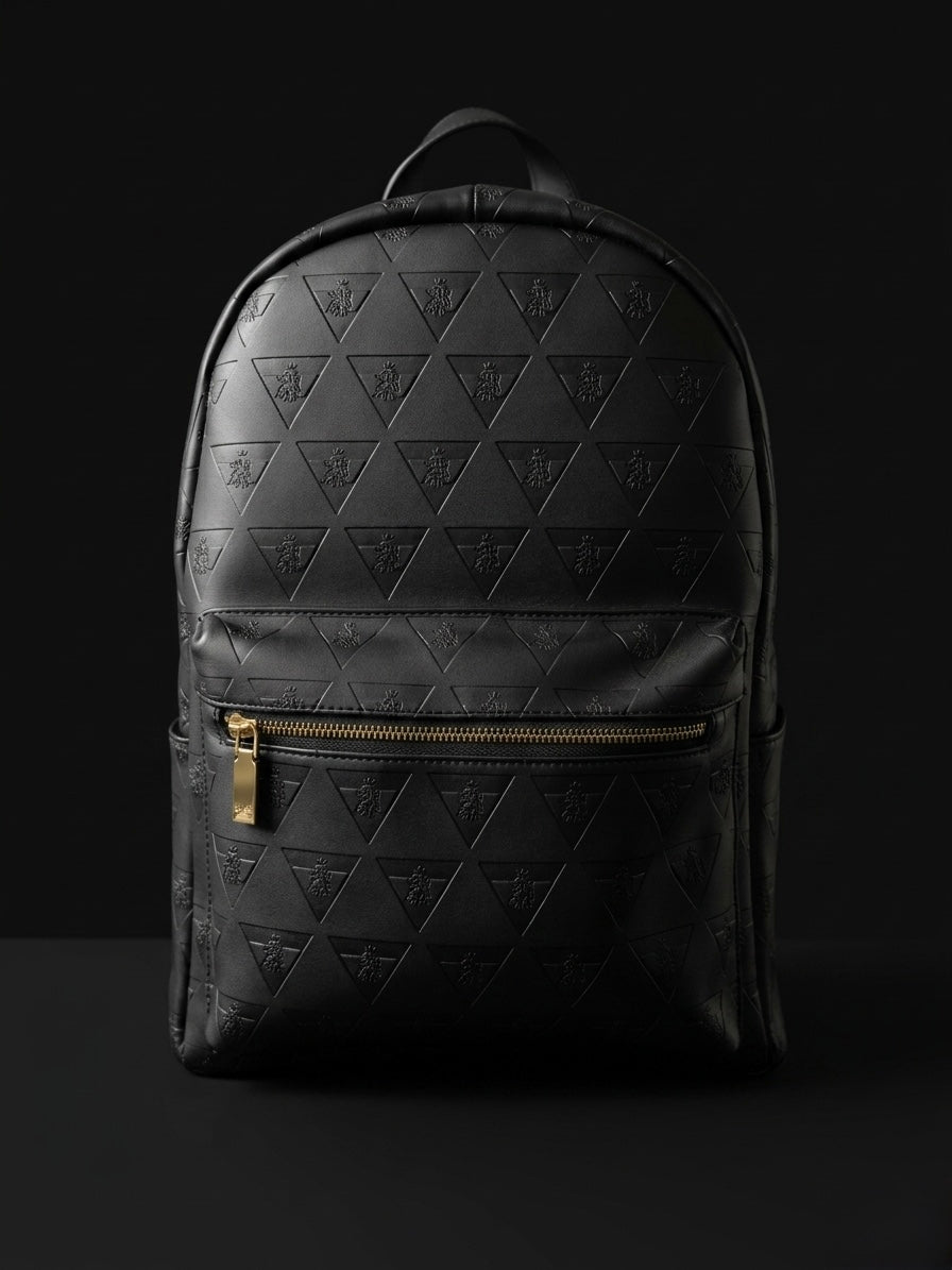 Leão Branco Motif full grain leather backpack on a dark background with structured silhouette for daily carry