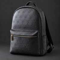 Three-quarter view of the R10 backpack showing its side depth, main zipper, and front pocket.