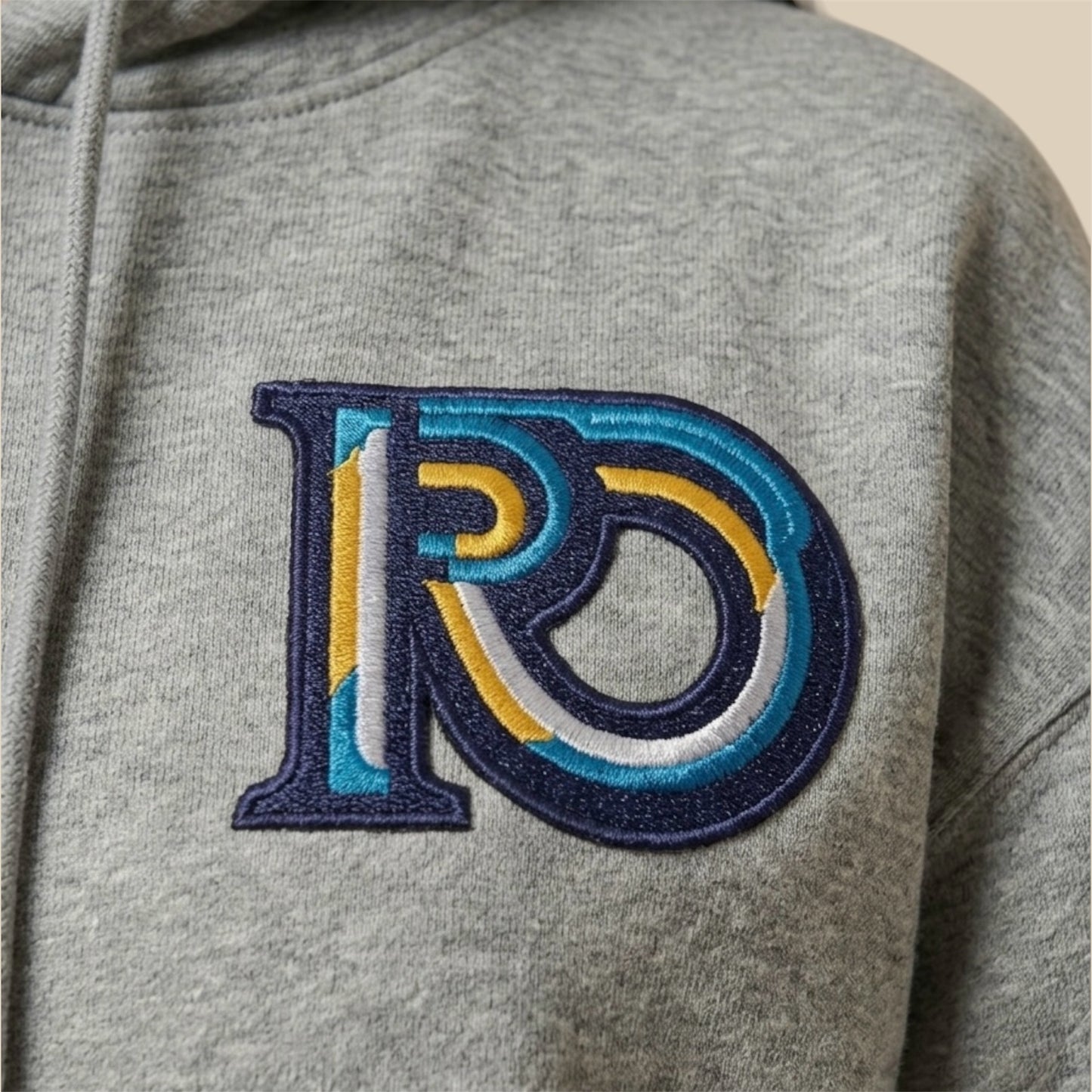 R10 graphite heather hoodie monogram embroidery detail