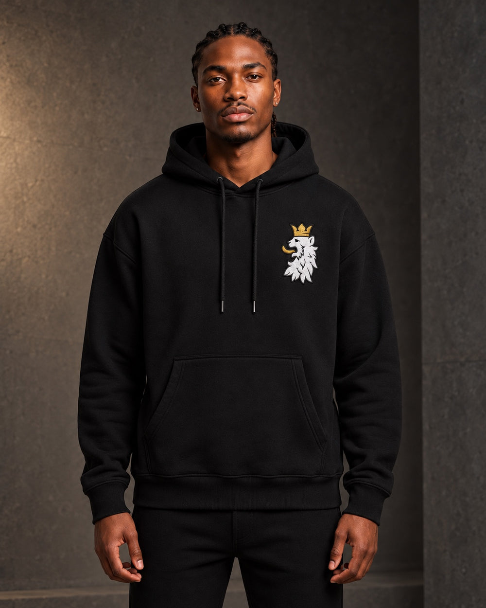 Leão Branco Motif Hoodie in black, front view on a model.