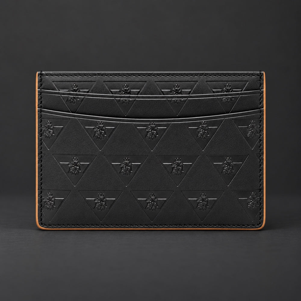 Front view of the black R10 Leão Branco cardholder, showing embossed motifs, card slots, and stitched edges.