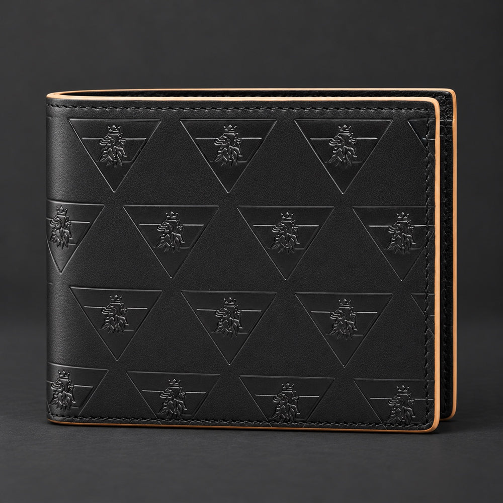 Closed black R10 Leão Branco wallet, showing its embossed motif, fold, and contrasting finished edges.