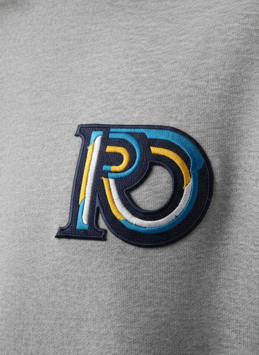 R10 graphite heather hoodie close up Monogram emblem detail