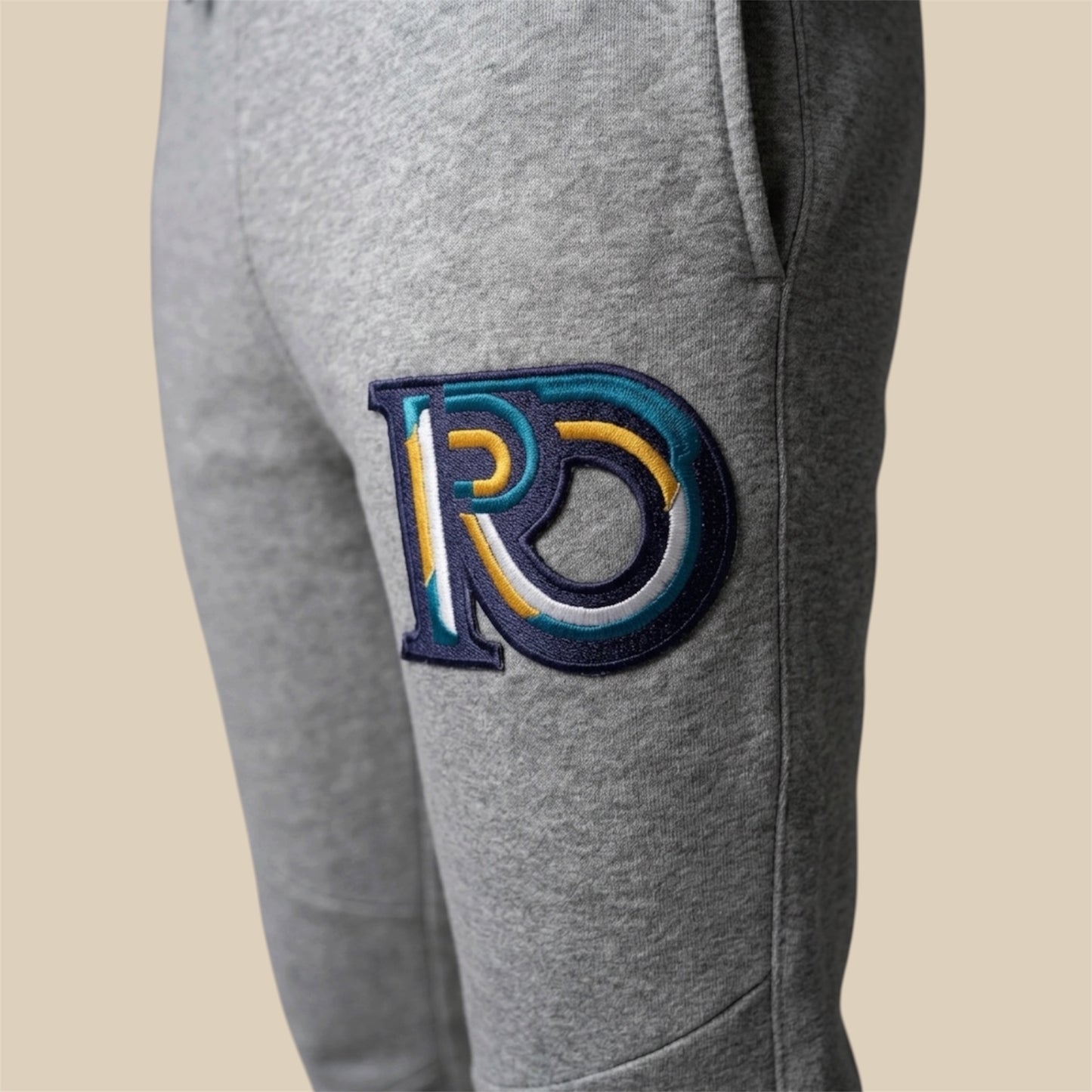 R10 graphite heather joggers Monogram embroidery detail