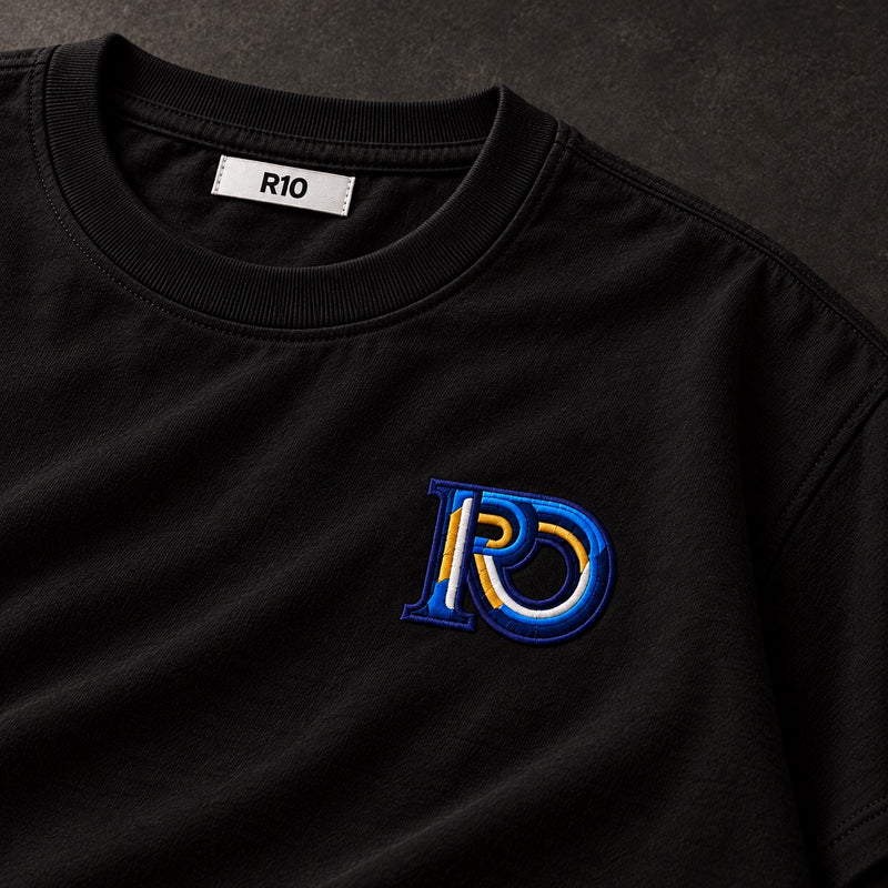Black R10 Monogram Tee — embroidery detail and inside R10 collar label.