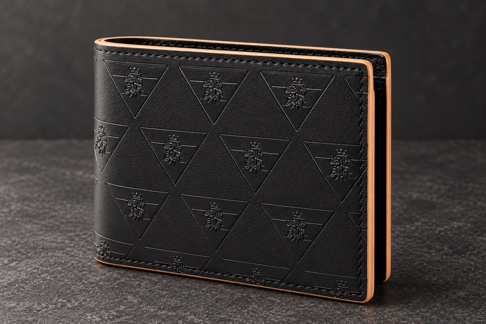R10 wallet on charcoal stone showing its embossed leather, perimeter stitching, fold, and contrasting finished edge.