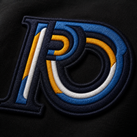 Close-up of the embroidered R10 Monogram on the R10 heavyweight hoodie, highlighting premium stitching and craftsmanship.
